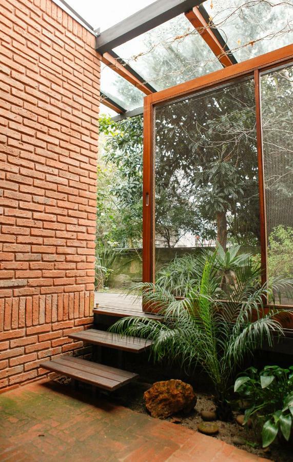 Quarto Duplo com varanda e vista para o jardim
