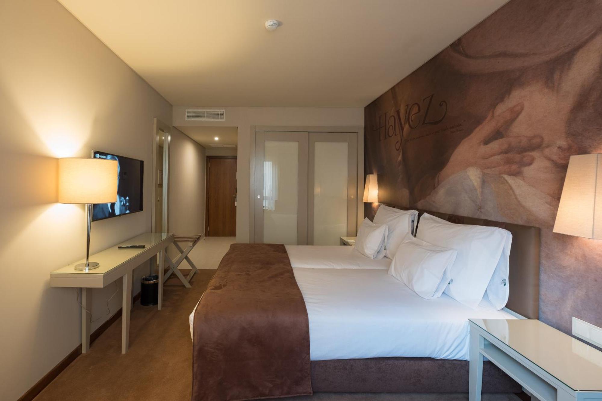 Quarto Twin com Cama Extra (2 Adultos + 1 Criança)